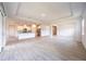 Open concept floor plan featuring a kitchen leading into the living room at 348 Conway Ave, St Cloud, FL 34771