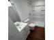 Bathroom featuring a vanity, toilet, and shower at 3815 Nw Avenue R Ave, Winter Haven, FL 33881