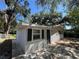 Single-story home with a freshly painted exterior, new windows, and a welcoming entrance at 3815 Nw Avenue R Ave, Winter Haven, FL 33881