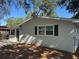Charming single-story home with a well-maintained front yard and black shutters at 3815 Nw Avenue R Ave, Winter Haven, FL 33881