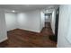 Spacious living room featuring hardwood floors and neutral paint at 3815 Nw Avenue R Ave, Winter Haven, FL 33881