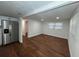 Spacious living room featuring wood-look floors and a bright atmosphere at 3815 Nw Avenue R Ave, Winter Haven, FL 33881