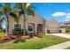 Inviting single-Gathering home with lush green lawn and lovely landscaping details at 3894 Wind Dancer Cir, St Cloud, FL 34772