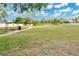 A community park offers green space and a walking path with benches for relaxation at 3894 Wind Dancer Cir, St Cloud, FL 34772