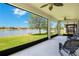 Relaxing screened patio with beautiful pond and backyard views at 3894 Wind Dancer Cir, St Cloud, FL 34772