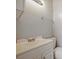Clean and functional bathroom with a white vanity, modern fixtures, and ample lighting in neutral color at 4215 S Semoran Blvd # 15, Orlando, FL 32822