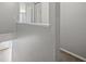 Hallway landing with clean walls, leading to both carpeted and tiled areas in neutral colors at 4215 S Semoran Blvd # 15, Orlando, FL 32822