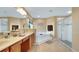 Large bathroom boasts double sinks, a soaking tub, and a separate glass shower at 506 Alleria Ct, Auburndale, FL 33823