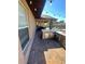Backyard patio area featuring outdoor kitchen and covered seating area with fan at 5719 Sweetheart Ct, St Cloud, FL 34772