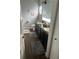 Bright bathroom with double vanity, wood look floors, and ample counter space at 5719 Sweetheart Ct, St Cloud, FL 34772