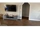 Comfortable living room featuring modern decor, a sleek TV stand, and stylish flooring at 5719 Sweetheart Ct, St Cloud, FL 34772