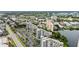 Great community view shows community, nearby parking, highway, and surrounding structures at 6165 Carrier Dr # 1603, Orlando, FL 32819