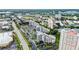 Stunning view features community, nearby parking, highway, and surrounding greenery at 6165 Carrier Dr # 1603, Orlando, FL 32819