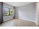 Bright bedroom with tile flooring and a large window offering ample natural light at 6165 Carrier Dr # 1603, Orlando, FL 32819