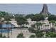 Scenic view of the community area with palm trees and lush greenery at 6165 Carrier Dr # 1603, Orlando, FL 32819