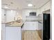 Bright kitchen featuring stainless steel appliances and granite countertops at 6165 Carrier Dr # 1603, Orlando, FL 32819