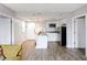 An open living space with modern kitchen featuring stainless steel appliances at 6165 Carrier Dr # 1603, Orlando, FL 32819
