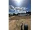 Backyard is prepped and ready for sod with a water well and irrigation system at 68 Water Track Loop, Ocala, FL 34472