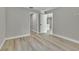 Bright and airy bedroom featuring neutral walls, white trim, and durable floors for a clean, modern look at 68 Water Track Loop, Ocala, FL 34472