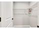 Walk-in closet featuring a wire shelf, perfect for maximizing storage space in the bedroom at 68 Water Track Loop, Ocala, FL 34472