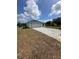 Charming home featuring fresh exterior paint, a garage and new brick paver driveway for curb appeal at 68 Water Track Loop, Ocala, FL 34472