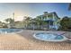 Resort-style community featuring a pool, spa, and clubhouse on a sunny day at 702 Gran Bahama Blvd, Davenport, FL 33897