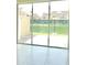 Sliding glass doors offer a clear view of the backyard and surrounding community at 7562 Sunflower Cir, Kissimmee, FL 34747