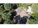 Aerial view of a community playground featuring geometric climbing structures and colorful play equipment at 7564 Sunflower Cir, Kissimmee, FL 34747