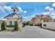 Community entry gate with security booth, well-maintained landscaping and clear signage, ensuring privacy at 7564 Sunflower Cir, Kissimmee, FL 34747