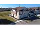 Beautiful two-story home featuring a manicured lawn and convenient parking at 7564 Sunflower Cir, Kissimmee, FL 34747