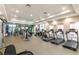 Well-equipped fitness center with state-of-the-art treadmills, weight machines, and ample natural light at 7564 Sunflower Cir, Kissimmee, FL 34747