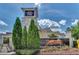 Summerville Resort entrance sign featuring a stone facade, manicured landscaping, and 'Your Vacation Home is Here!' signage at 7564 Sunflower Cir, Kissimmee, FL 34747