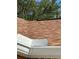 Close up of the roof's shingles, gutters, and the surrounding leafy trees at 804 Carrousel Ln, Kissimmee, FL 34759