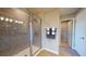 Elegant bathroom featuring a glass-enclosed shower and tile accents at 812 Lake Dell Rd, Dundee, FL 33838