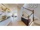 Bright foyer features modern decor, stairs, beautiful flooring and modern chandelier and natural light at 812 Lake Dell Rd, Dundee, FL 33838