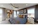 Serene main bedroom featuring natural light and contemporary decor at 812 Lake Dell Rd, Dundee, FL 33838