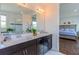 Bathroom featuring double vanity with quartz countertops at 8228 Randal Park Blvd, Orlando, FL 32832
