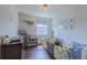 Bright Bedroom with dark wood floors, safety enclosure, and closet storage at 8228 Randal Park Blvd, Orlando, FL 32832