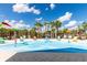 Vibrant splash pad with playful water features and comfortable seating, offering a delightful recreational space at 8228 Randal Park Blvd, Orlando, FL 32832