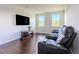 Home theater room with tiered seating and large screen display at 8228 Randal Park Blvd, Orlando, FL 32832