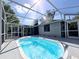 Beautiful screened-in pool offering a refreshing escape with plenty of room for relaxation and fun in the sun at 905 W 11Th Ave, Mount Dora, FL 32757