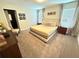 Serene bedroom with neutral tones, plush carpet, and ample natural light at 9055 Dogleg Dr, Davenport, FL 33896