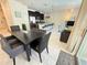 Spacious living area featuring an open-plan design with modern decor and seamless flow at 9055 Dogleg Dr, Davenport, FL 33896