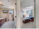 View of two bedrooms, one with two twin beds and the other with one queen bed at 997 Lake Berkley Dr, Kissimmee, FL 34746