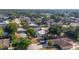 Property showing a home with a new metal roof nestled amongst mature trees in a quiet neighborhood setting at 1018 Jersey Ave, St Cloud, FL 34769