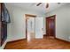 Bedroom with hardwood floors, trim, and window looking out to water at 1018 Jersey Ave, St Cloud, FL 34769