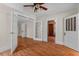Spacious living room featuring hardwood floors and multiple doorways at 1018 Jersey Ave, St Cloud, FL 34769