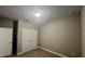 Neutral bedroom with double door closet and plush carpeting, creates a serene and comfortable space at 12253 S Bracco St, Winter Garden, FL 34787
