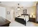 Comfortable bedroom featuring a ceiling fan and neutral decor, creating a cozy and inviting atmosphere at 130 Los Gatos Pl, Kissimmee, FL 34759