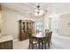 Dining area boasts a wooden table with seating for six and a large decorative hutch at 130 Los Gatos Pl, Kissimmee, FL 34759